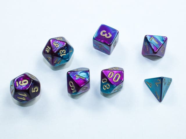 Chessex | Mini-hedral Dice Set | Acrylic | Gemini Purple-Teal/gold (CHX 20649)