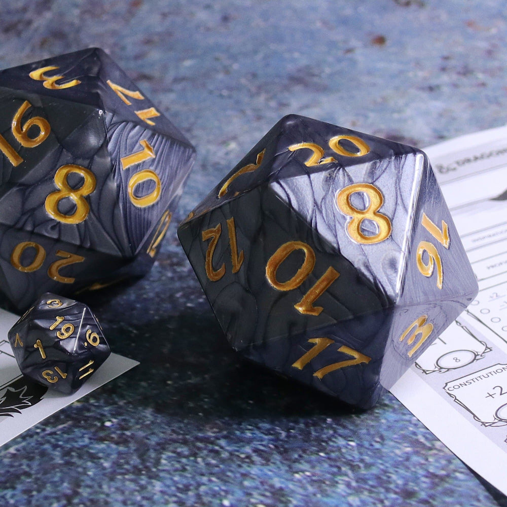 Colossal d20 (55mm) | Black Pearl w/ Gold Ink