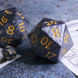 Colossal d20 (55mm) | Black Pearl w/ Gold Ink